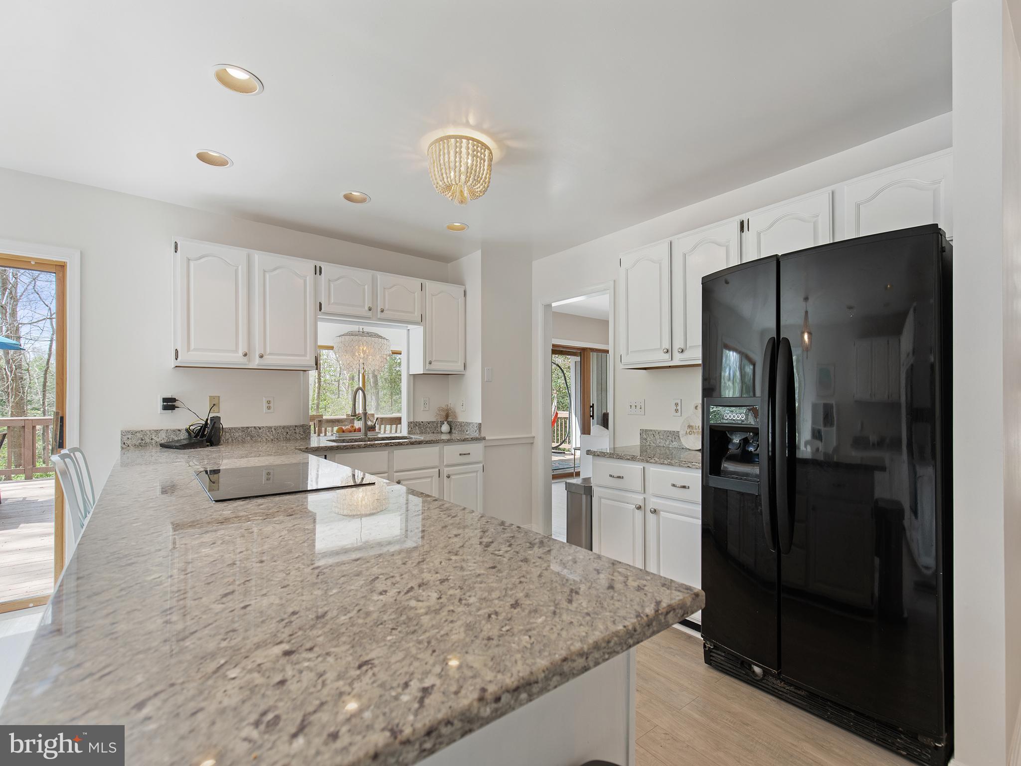 819 Big Road Lusby, MD 20657 - Photo 14 of 55 Kitchen through to dining