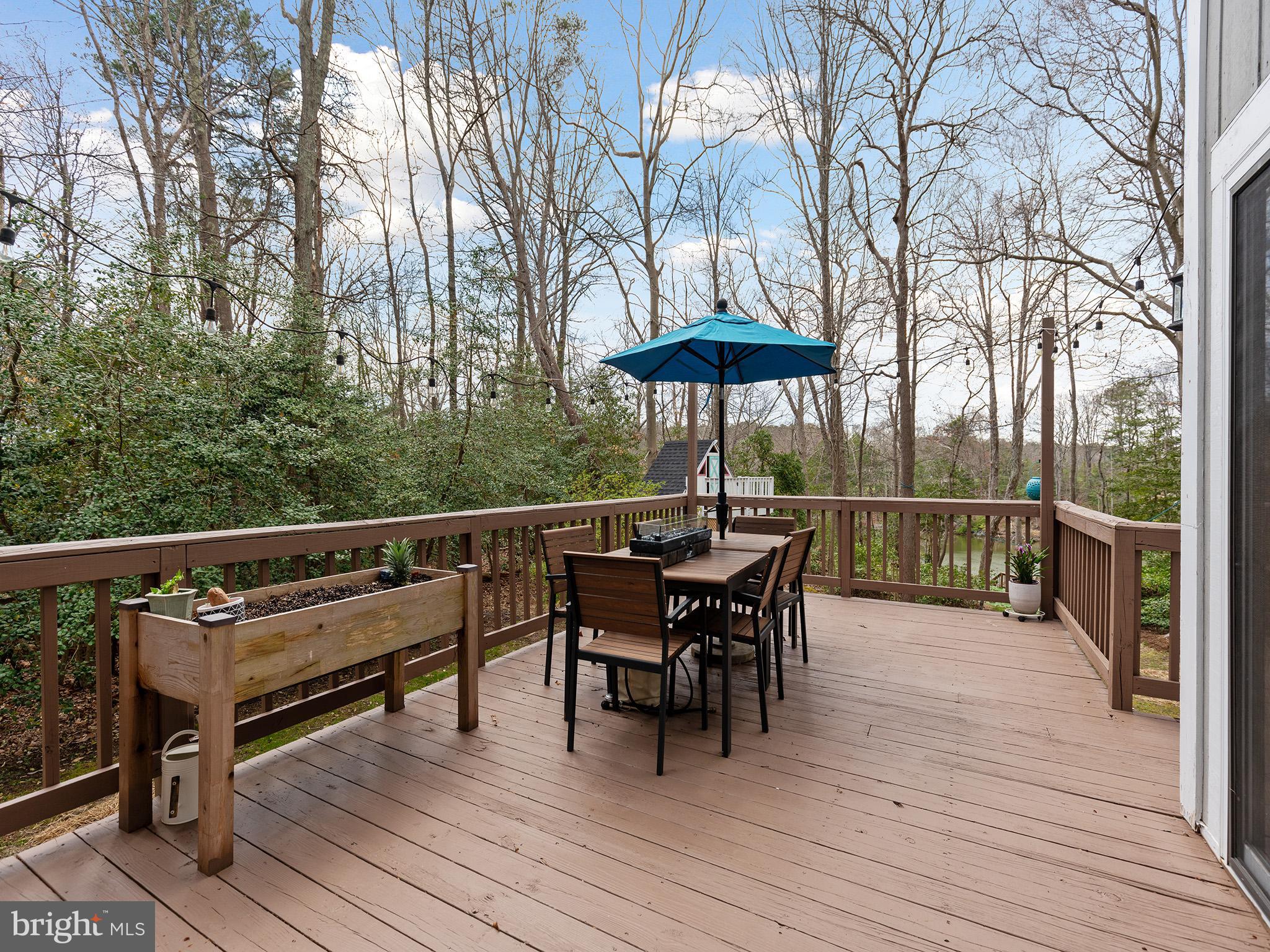 819 Big Road Lusby, MD 20657 - Photo 21 of 55 Outdoor dining deck off of the kitchen/Dining