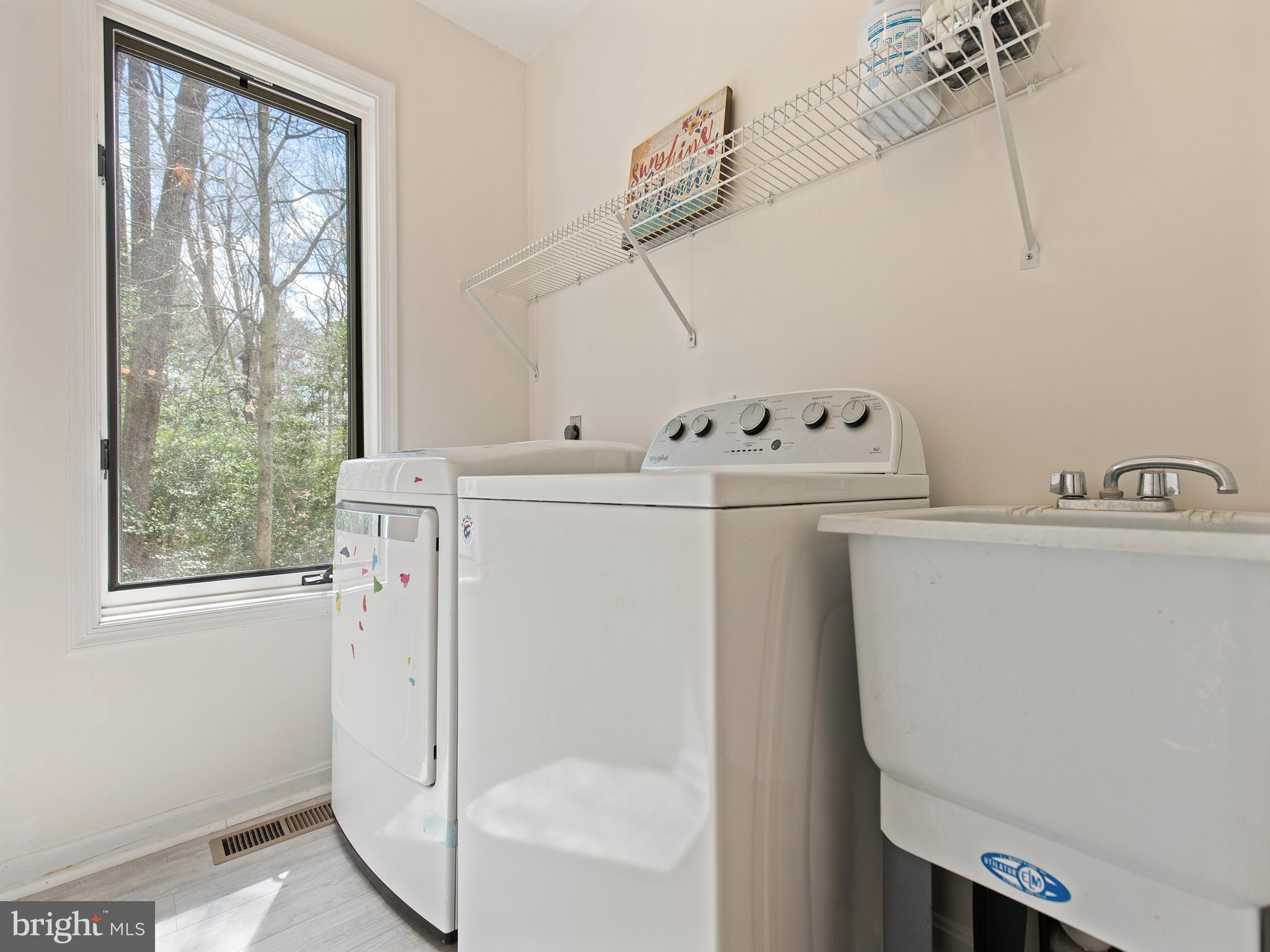 819 Big Road Lusby, MD 20657 - Photo 25 of 55 Laundry room with scrub sink.