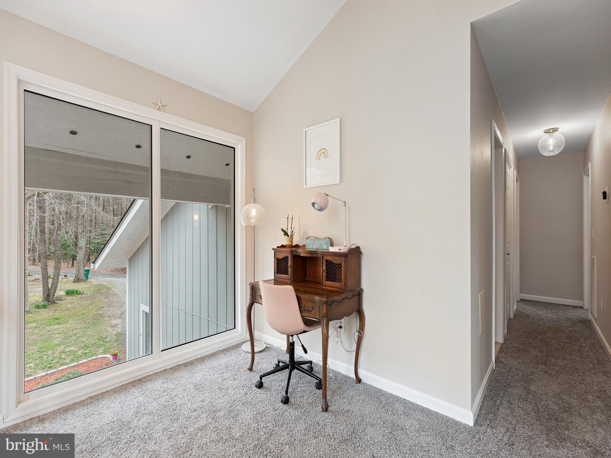 819 Big Road Lusby, MD 20657 - Photo 26 of 55 Upper level loft space with lawn views