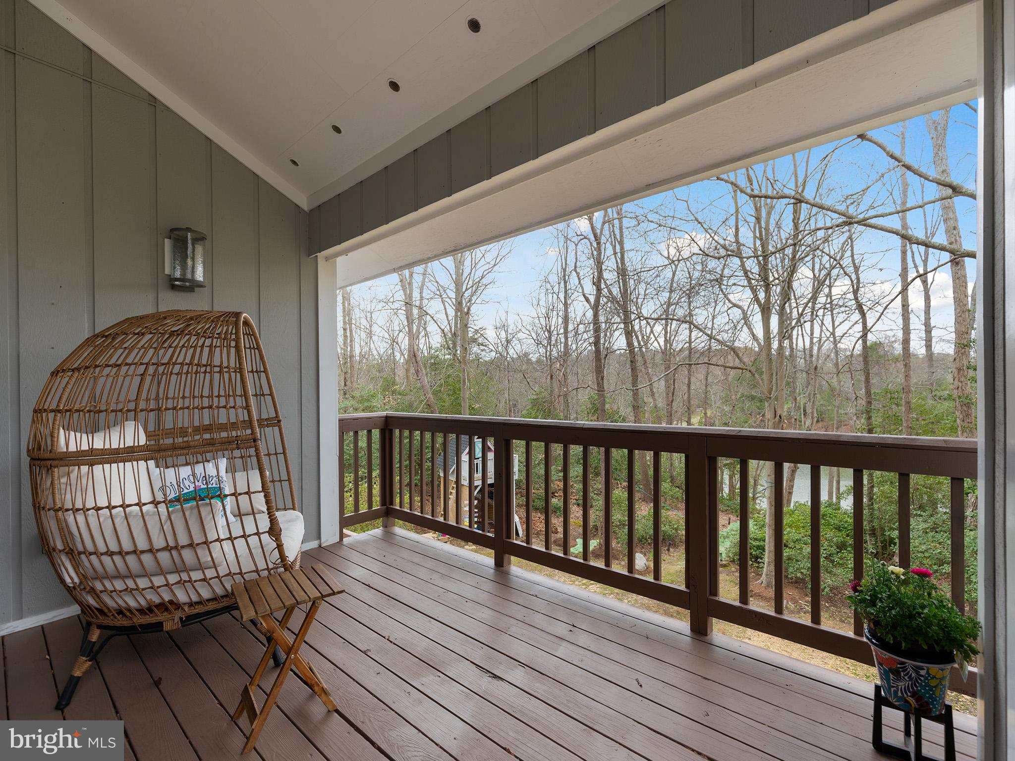 819 Big Road Lusby, MD 20657 - Photo 28 of 55 Covered balcony with creek views. #coffee