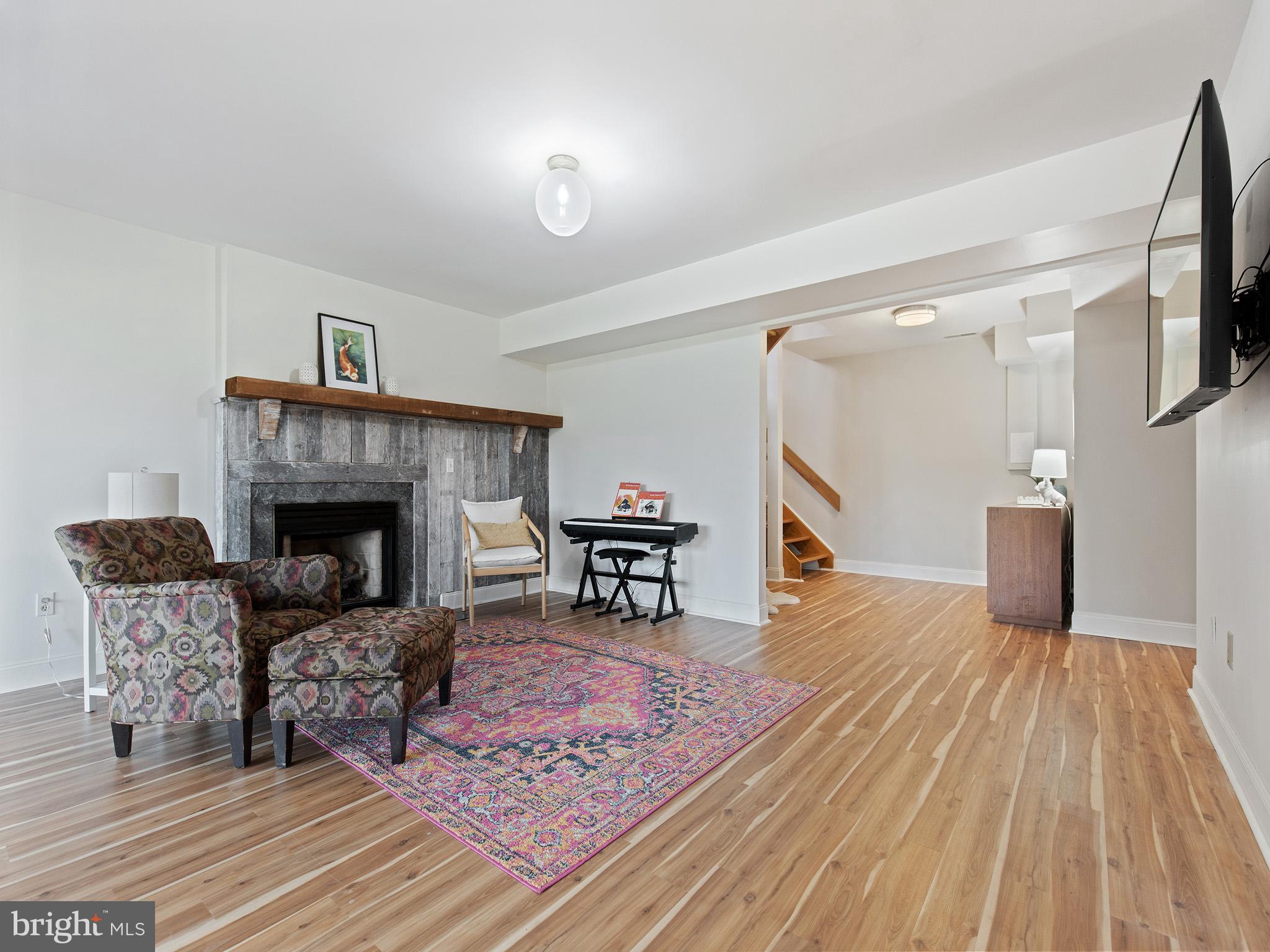 819 Big Road Lusby, MD 20657 - Photo 40 of 55 Lower level family room with 3rd FP
