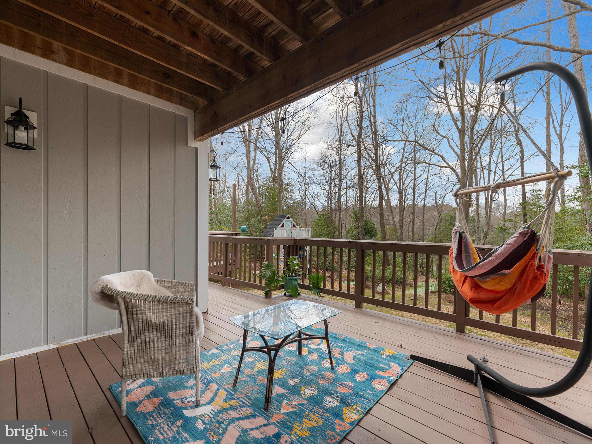 819 Big Road Lusby, MD 20657 - Photo 10 of 55 Balcony over looking yard and looking to the pier