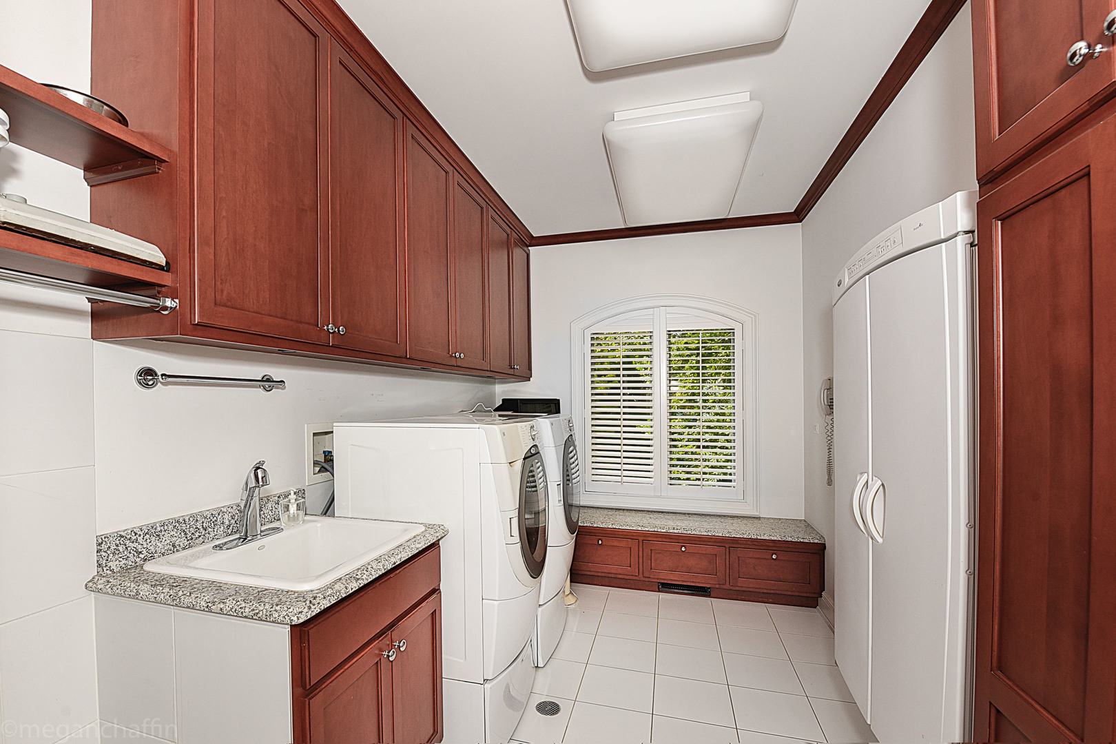 650 Arbor Drive Lake Bluff, IL 60044 - Photo 11 of 49 a kitchen with a sink cabinets and window