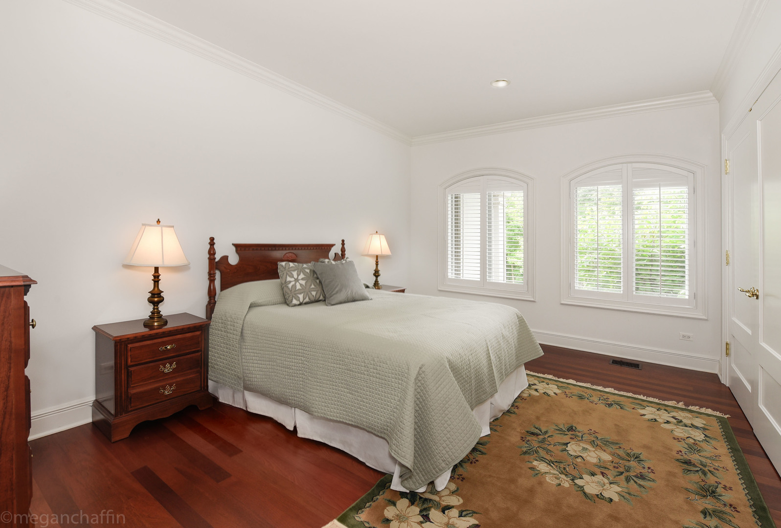 650 Arbor Drive Lake Bluff, IL 60044 - Photo 13 of 49 a bedroom with a bed and a lamp