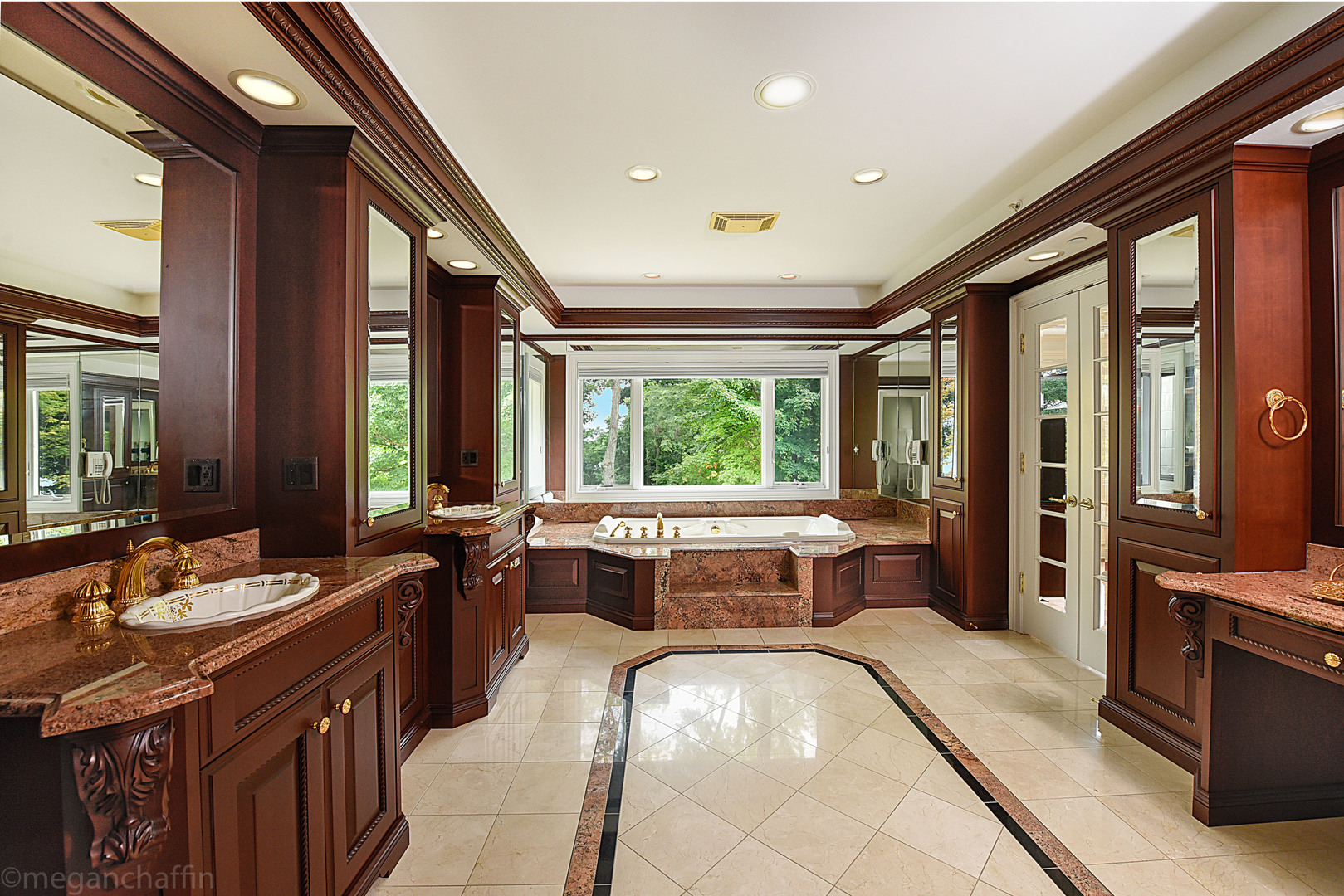 650 Arbor Drive Lake Bluff, IL 60044 - Photo 24 of 49 a large kitchen with kitchen island granite countertop a large window