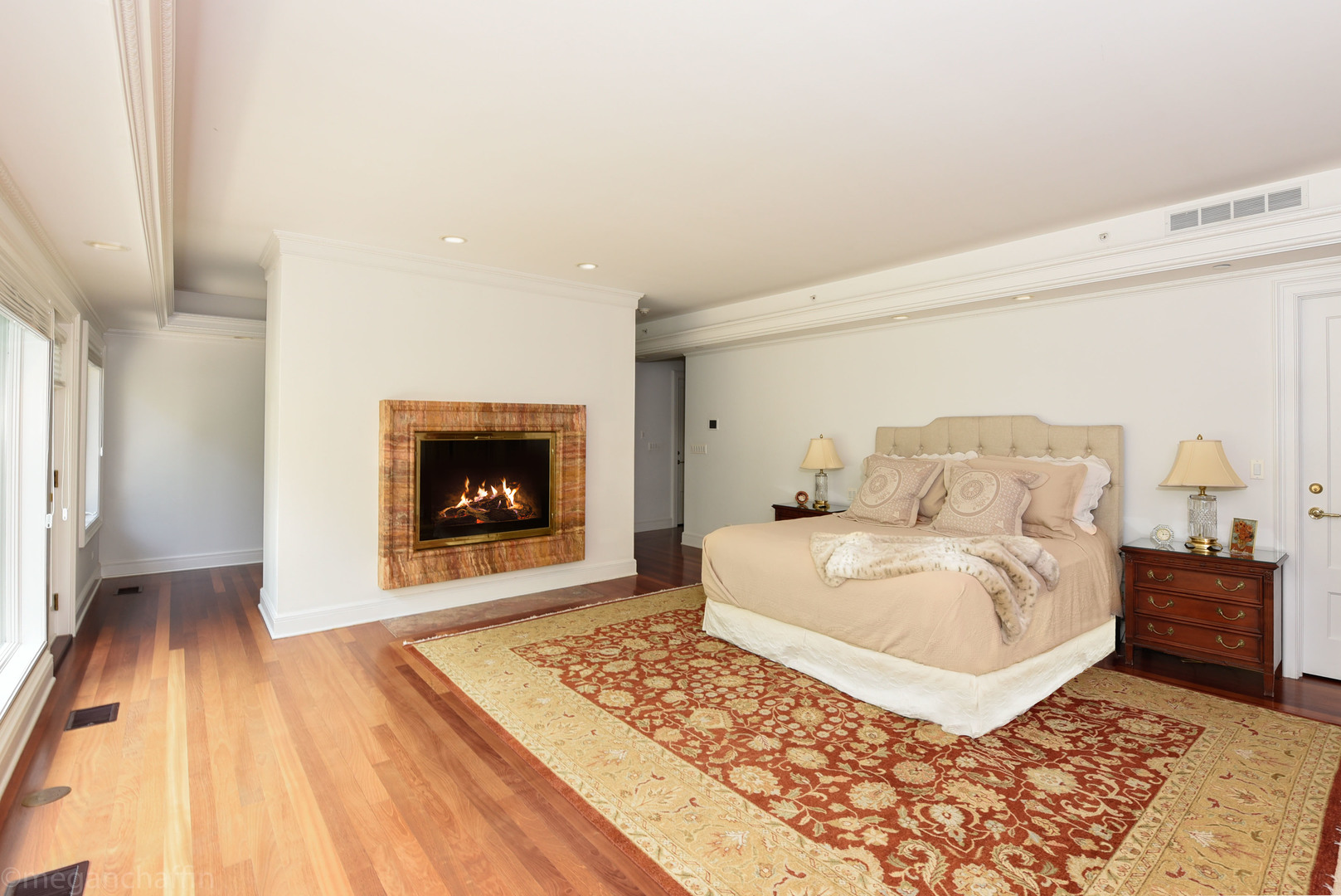 650 Arbor Drive Lake Bluff, IL 60044 - Photo 27 of 49 a bedroom with a bed and a fireplace