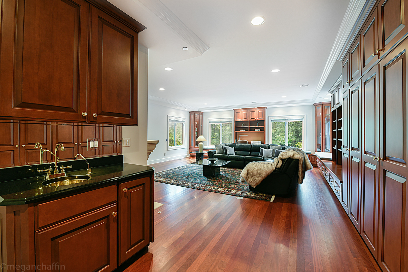 650 Arbor Drive Lake Bluff, IL 60044 - Photo 30 of 49 a kitchen with sink refrigerator stove dining table and chairs