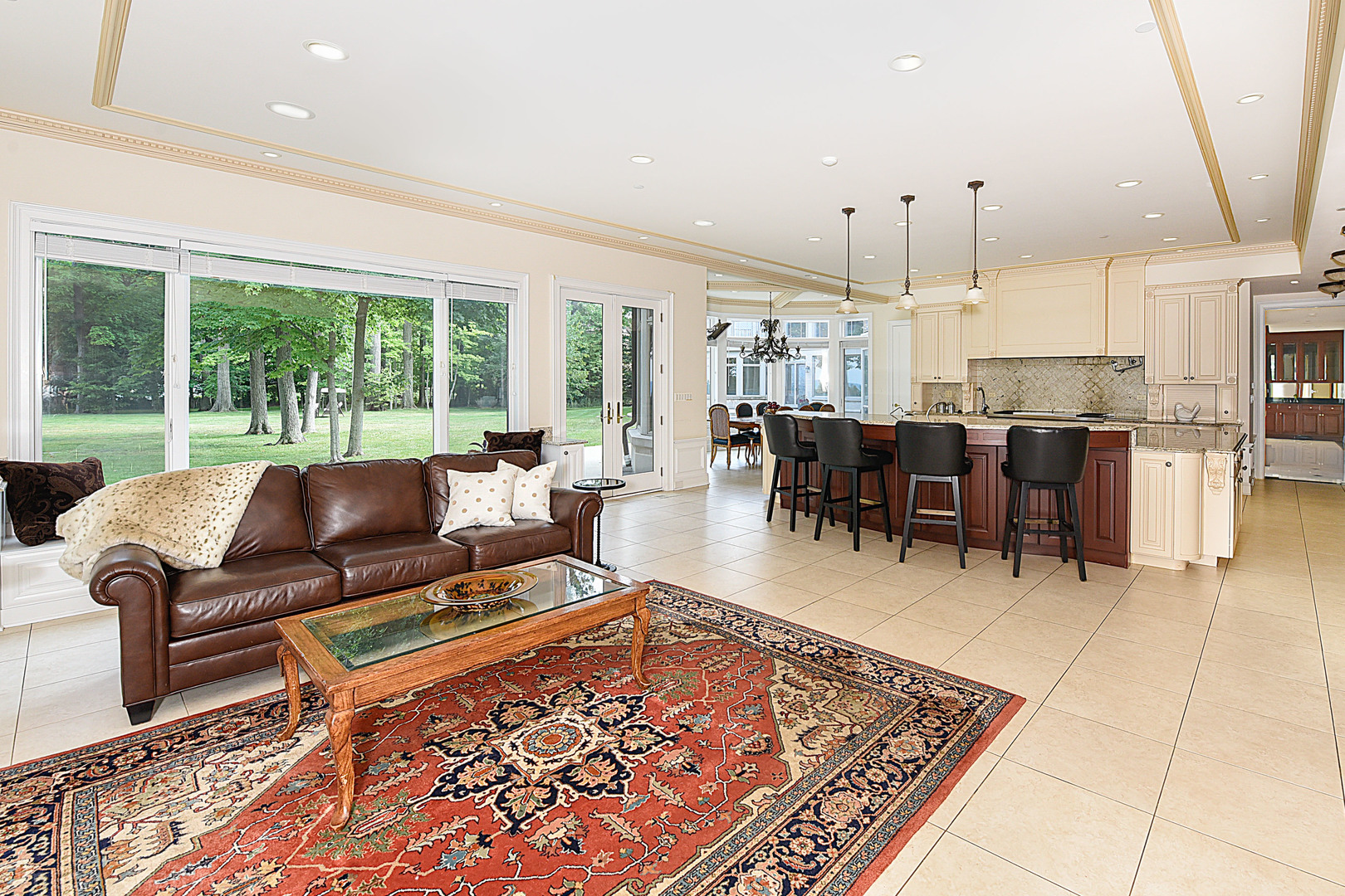 650 Arbor Drive Lake Bluff, IL 60044 - Photo 35 of 49 a living room with lots of furniture and a dining table