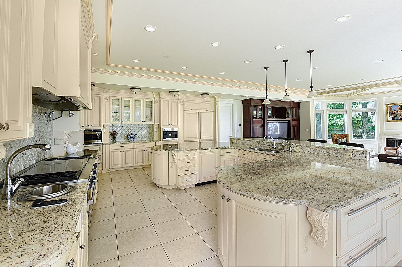 650 Arbor Drive Lake Bluff, IL 60044 - Photo 37 of 49 a kitchen with stainless steel appliances granite countertop a sink a stove and a granite counter tops