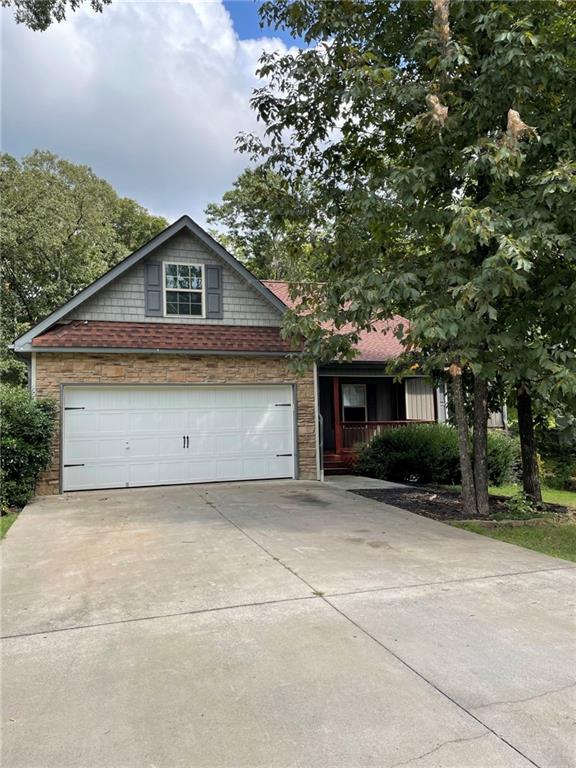 323 Talon Drive Southeast Rydal, GA 30171 - Photo 1 of 1 a front view of a house with a yard