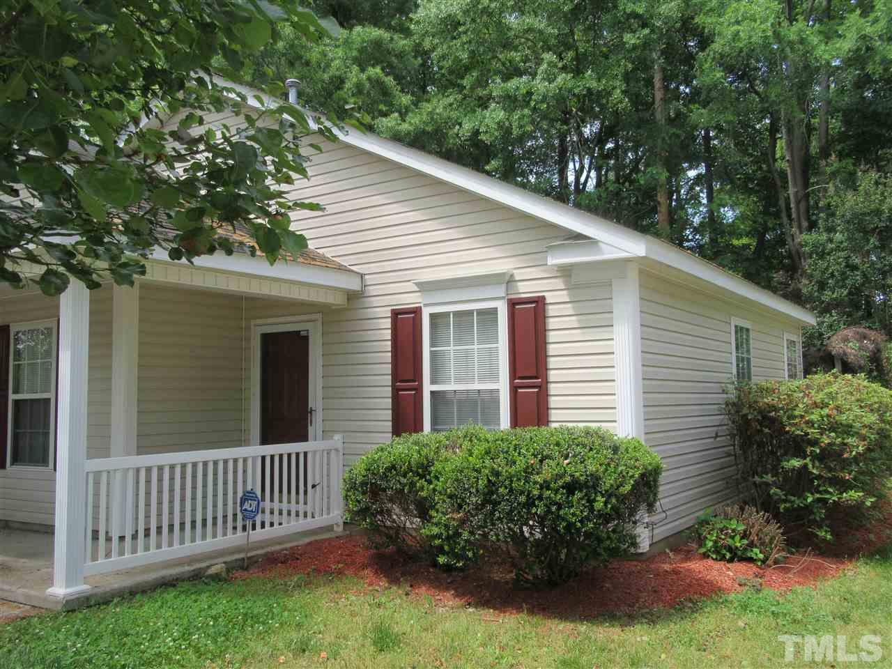 5113 Silverdene Street Raleigh, NC 27616 - Photo 20 of 25 a front view of a house with garden