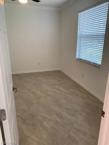 an empty room with a window