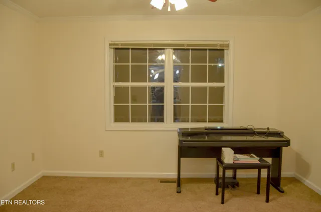 a kitchen with stainless steel appliances granite countertop a sink and a refrigerator