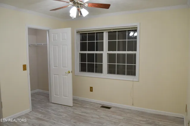 a view of a livingroom with wooden floor