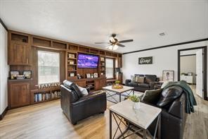 7466 County Road 573 Blue Ridge, TX 75424 - Photo 9 of 25 a living room with furniture a dining table and a flat screen tv
