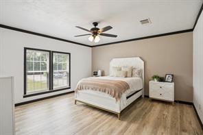 7466 County Road 573 Blue Ridge, TX 75424 - Photo 10 of 25 a spacious bedroom with a bed and a large window
