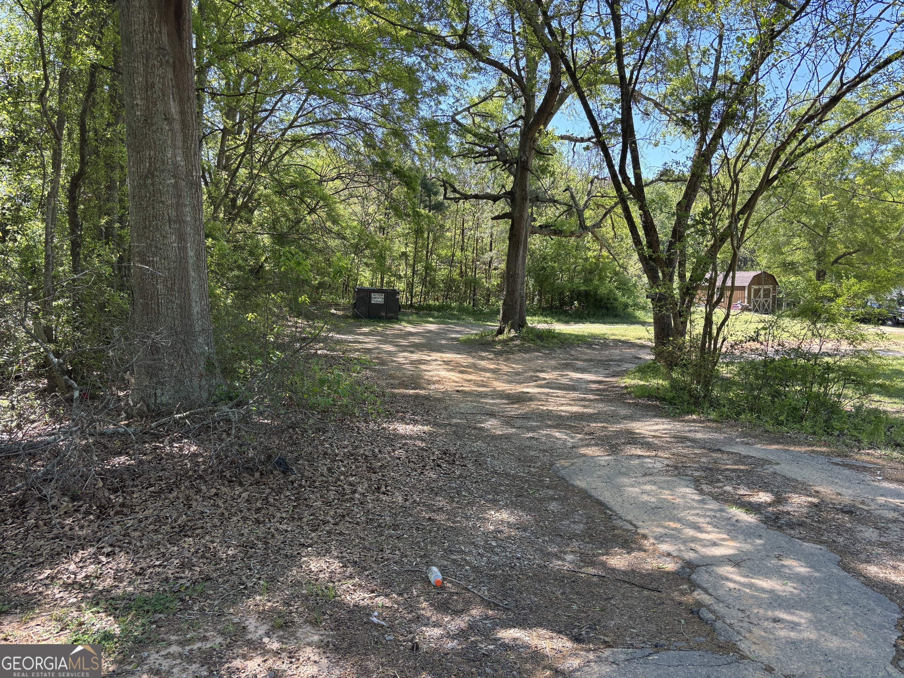 5250 Hightower Trail Oxford, GA 30054 - Photo 2 of 4 a view of a tree in the middle of a forest