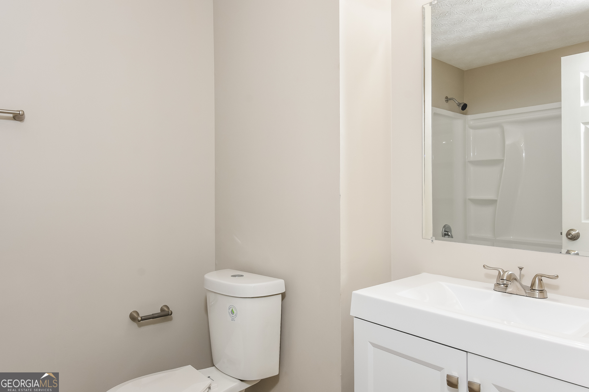 4809 Nature Trail Austell, GA 30106 - Photo 12 of 17 a bathroom with a sink a toilet and a mirror