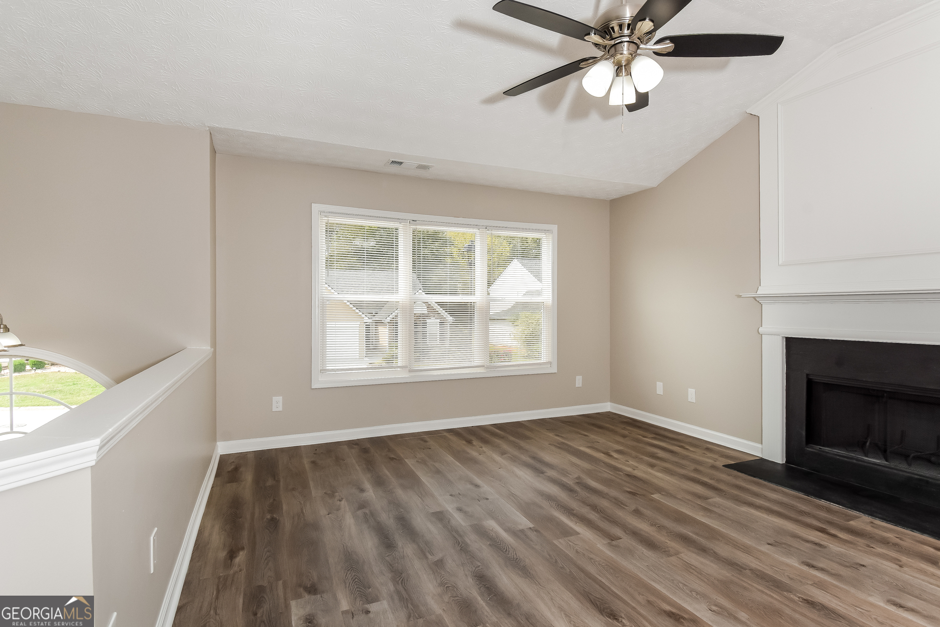 4809 Nature Trail Austell, GA 30106 - Photo 2 of 17 a view of an empty room with wooden floor and a window