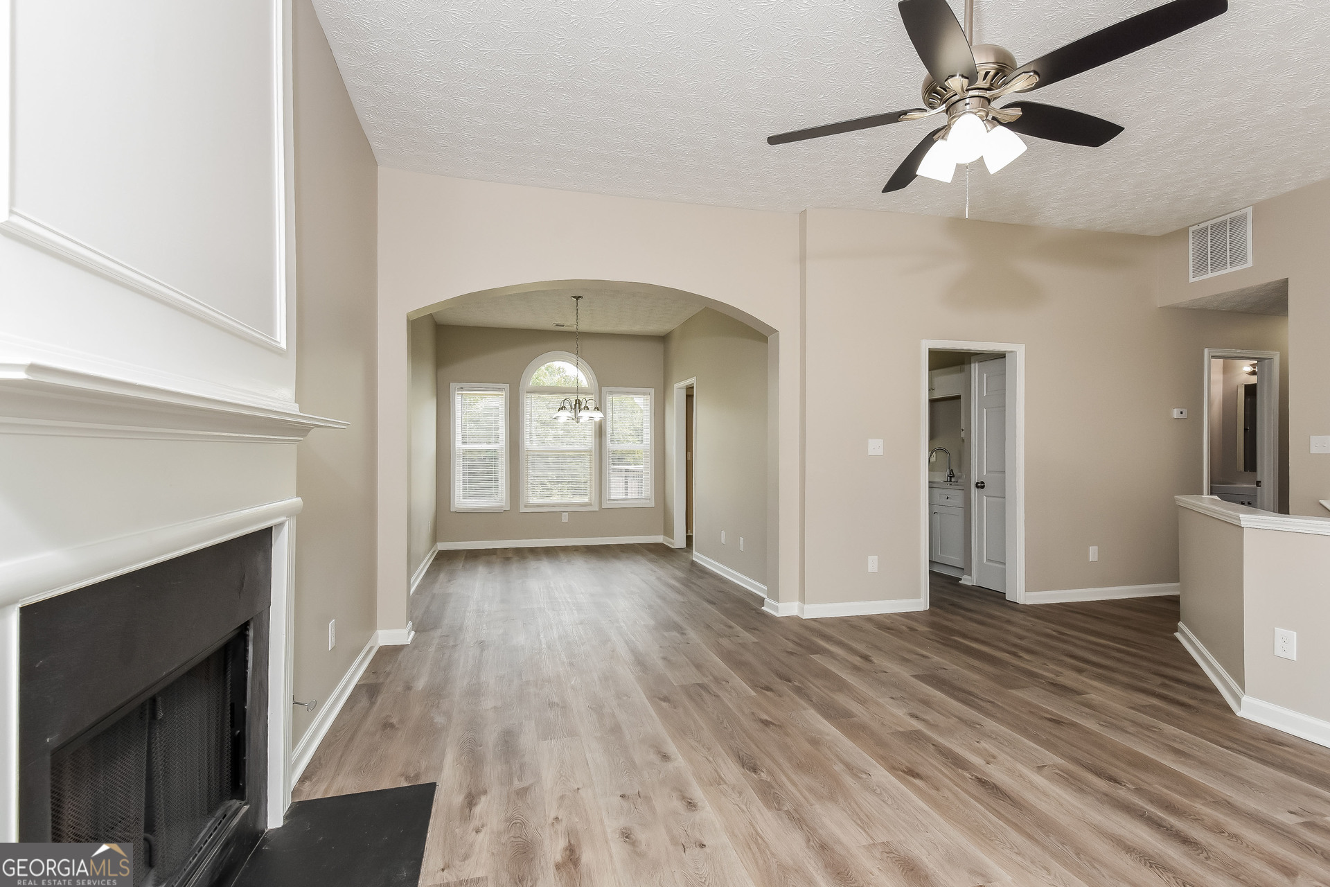 4809 Nature Trail Austell, GA 30106 - Photo 3 of 17 a view of livingroom with hardwood floor and a ceiling fan