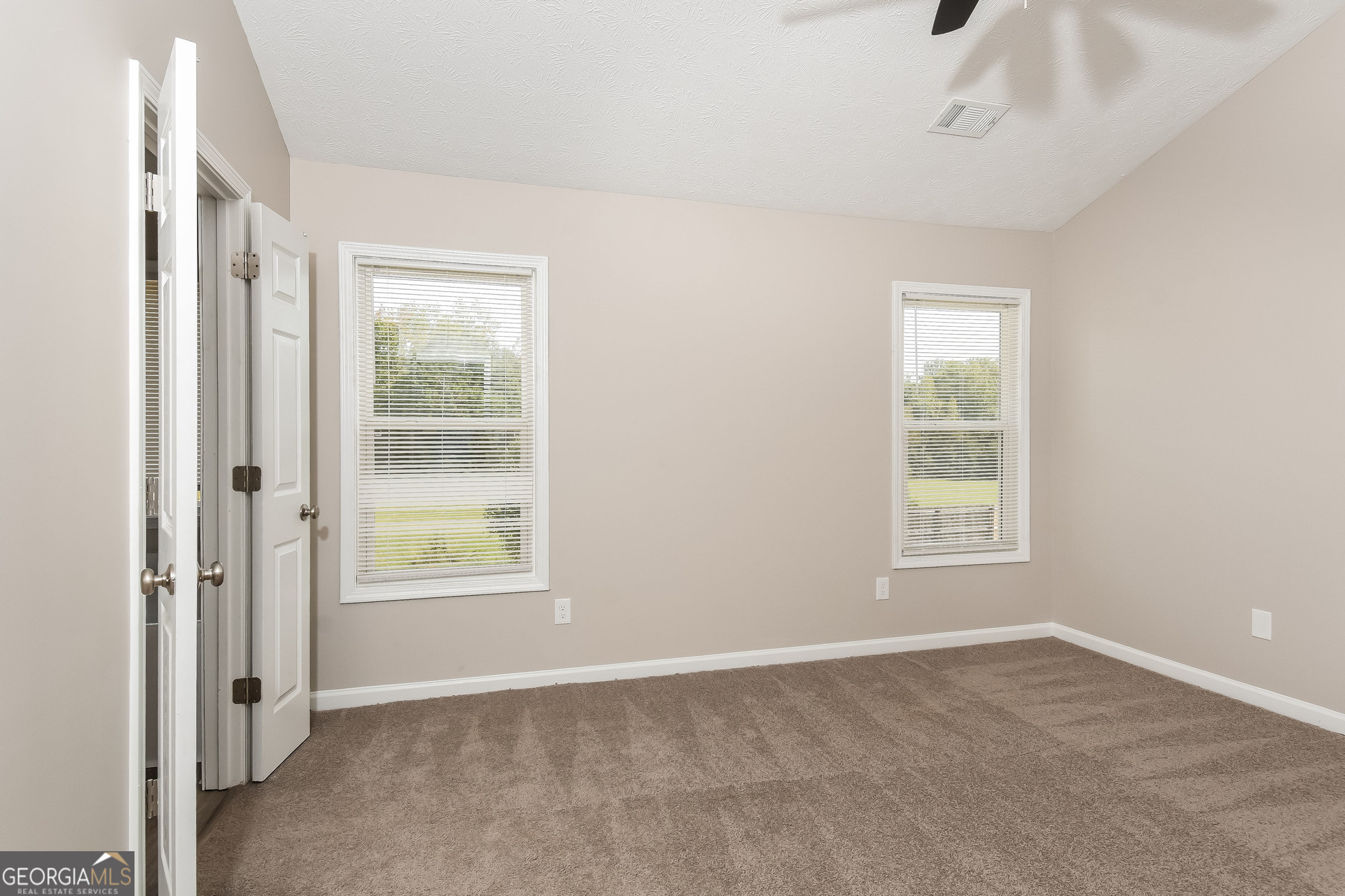 4809 Nature Trail Austell, GA 30106 - Photo 7 of 17 an empty room with windows and closet
