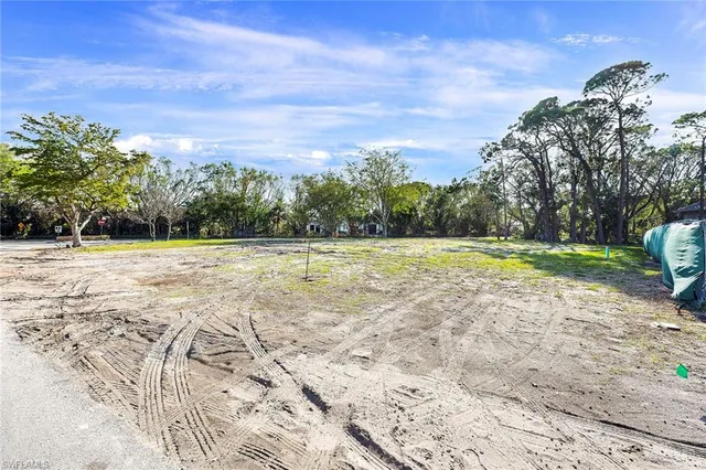 a view of outdoor space with swimming pool and green space