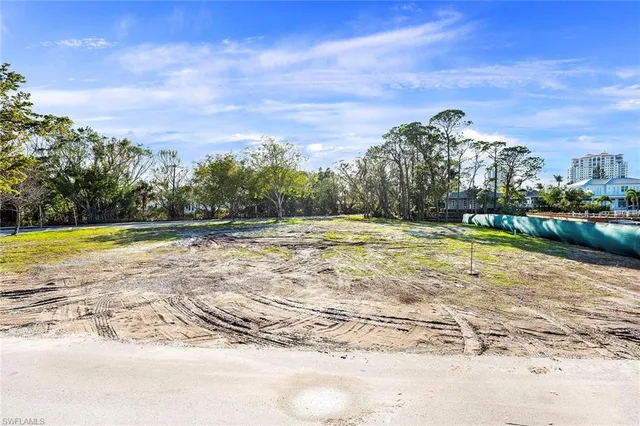 a view of a swimming pool and a yard