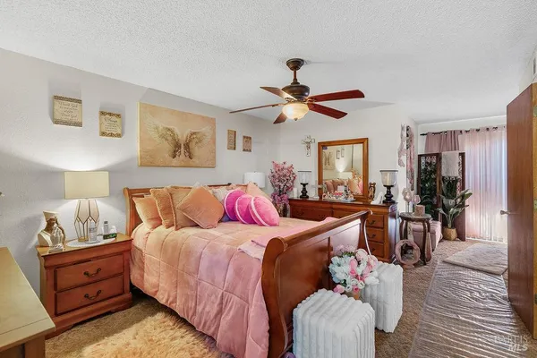 a bed room with bed and furniture