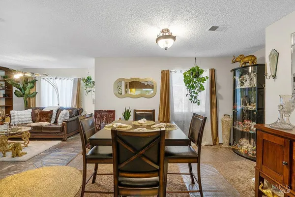 a view of a dining room with furniture