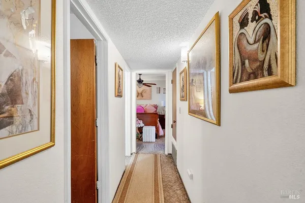 a view of a hallway with interior of the house