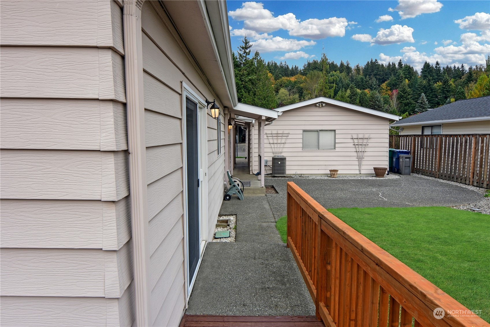 23716 Lake Drive East Bothell, WA 98021 - Photo 9 of 28 a view of house with backyard and trees