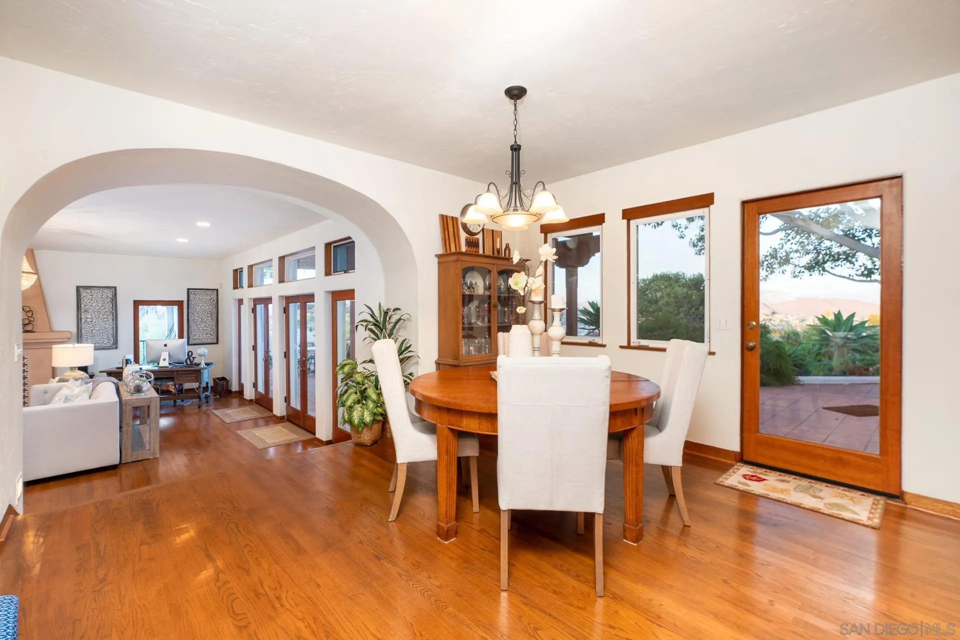 553 Rimrock Road El Cajon, CA 92020 - Photo 15 of 43 a view of a dining room with furniture window and wooden floor