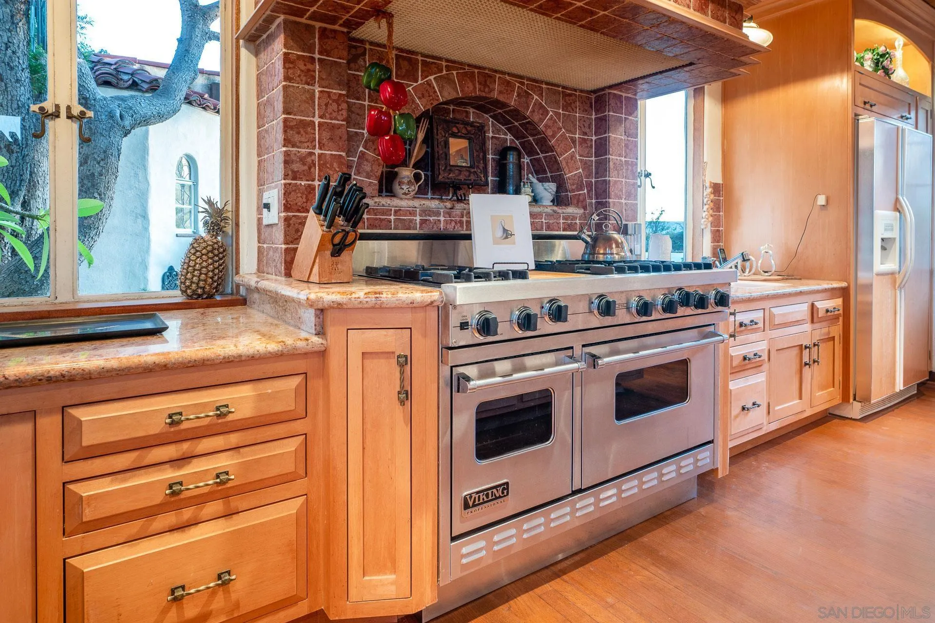 553 Rimrock Road El Cajon, CA 92020 - Photo 17 of 43 a kitchen with stainless steel appliances granite countertop a stove and a sink