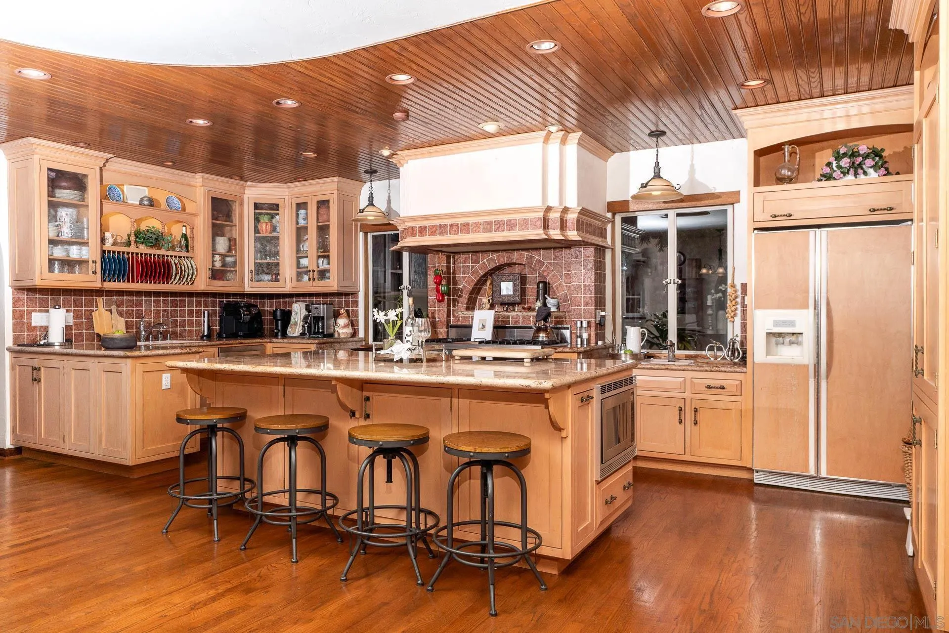 553 Rimrock Road El Cajon, CA 92020 - Photo 18 of 43 a kitchen with stainless steel appliances granite countertop a sink and cabinets