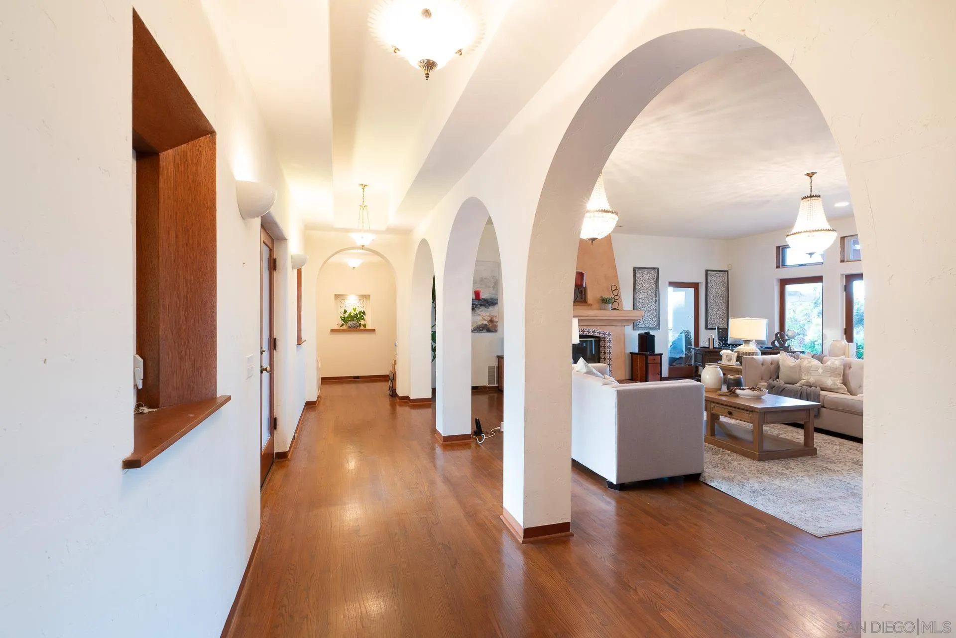 553 Rimrock Road El Cajon, CA 92020 - Photo 23 of 43 a living room with furniture and a wooden floor