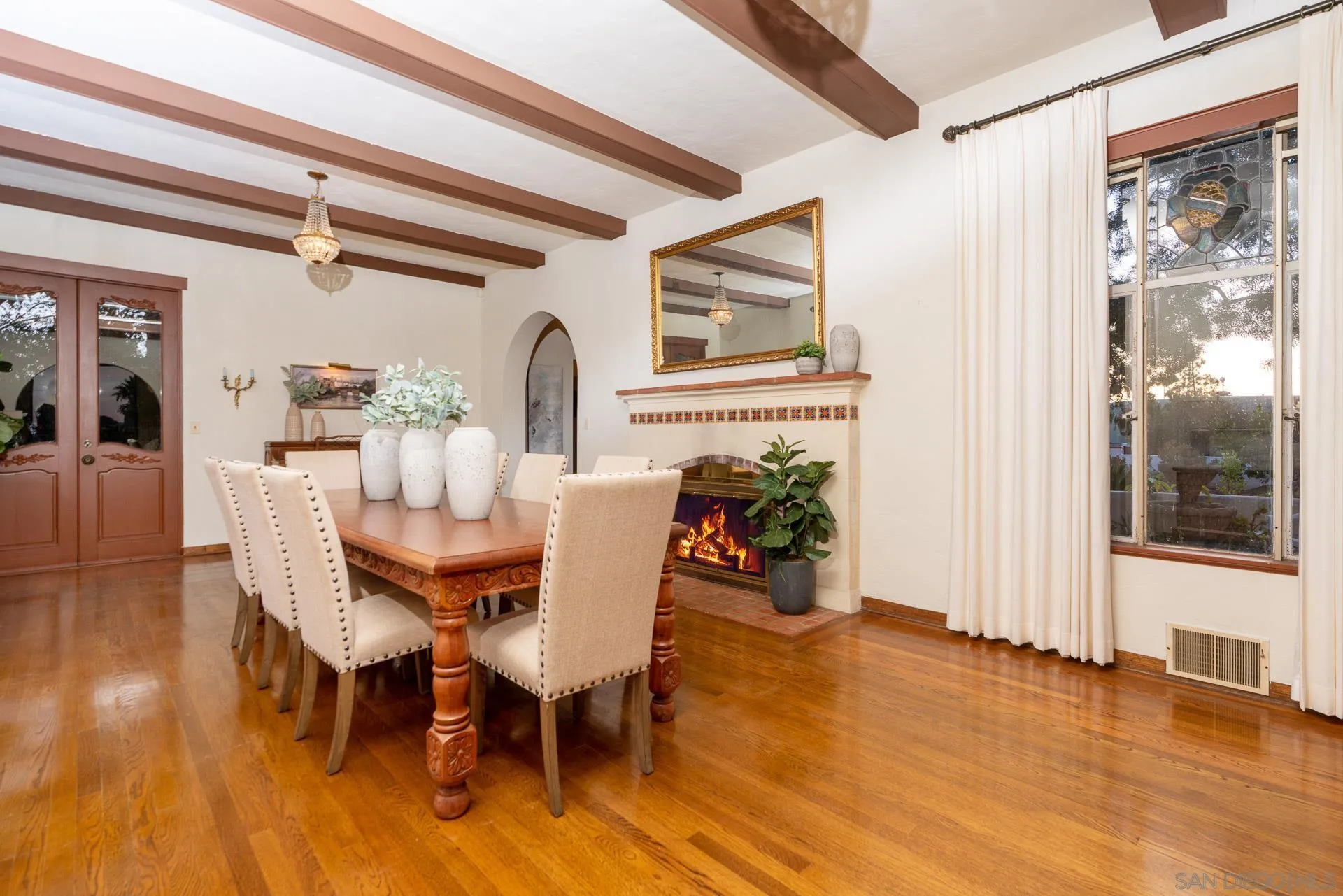553 Rimrock Road El Cajon, CA 92020 - Photo 26 of 43 a dining room with furniture and wooden floor