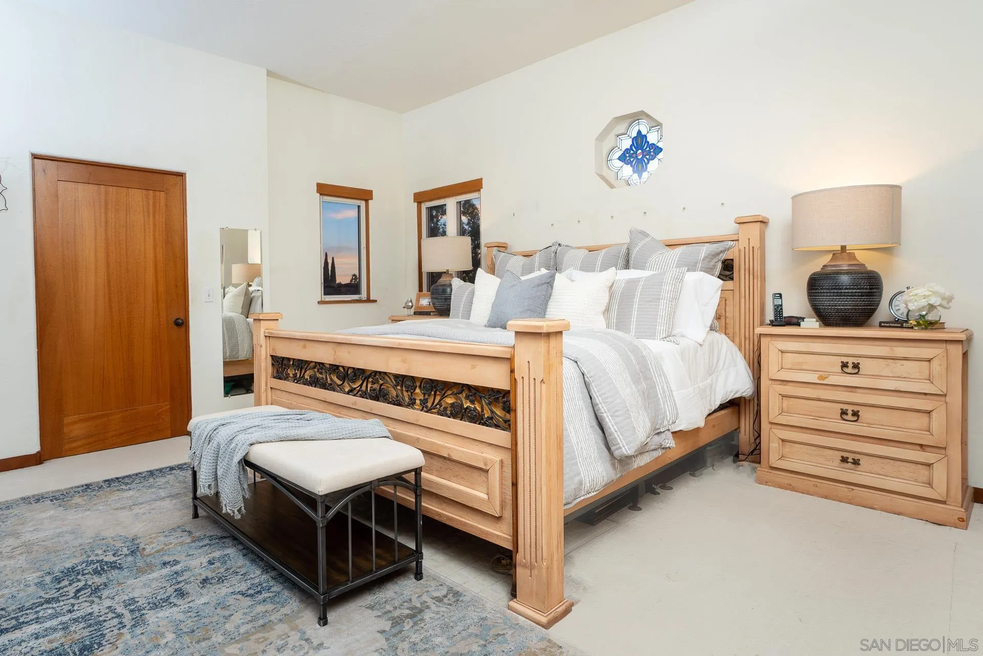 553 Rimrock Road El Cajon, CA 92020 - Photo 30 of 43 a bedroom with a bed and a dresser