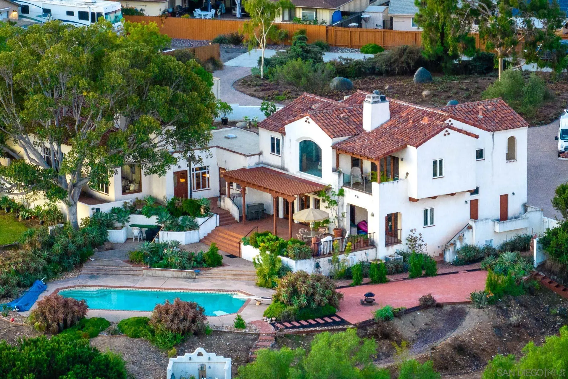 553 Rimrock Road El Cajon, CA 92020 - Photo 4 of 43 an aerial view of residential houses with yard