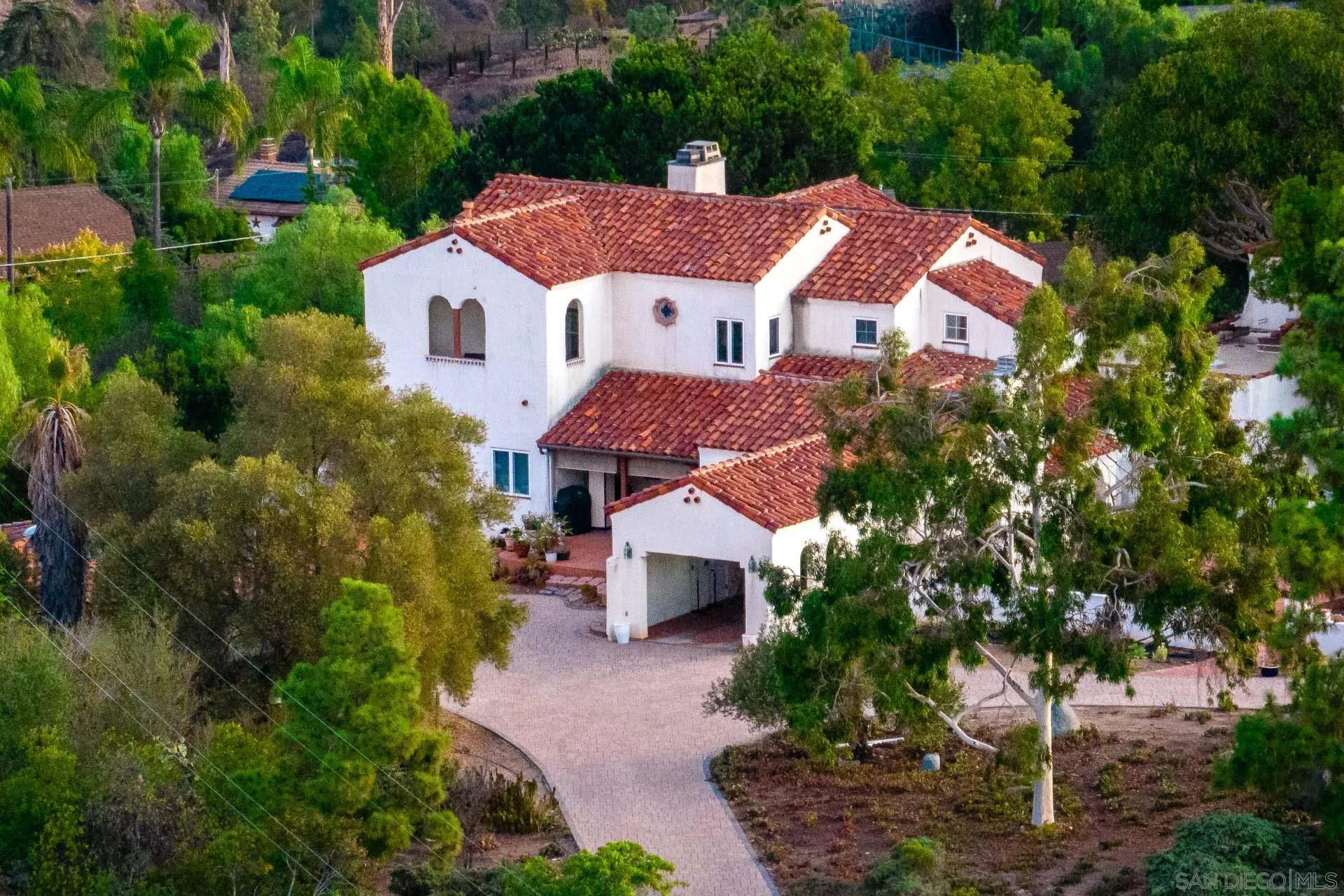 553 Rimrock Road El Cajon, CA 92020 - Photo 5 of 43 a aerial view of a house with swimming pool and garden