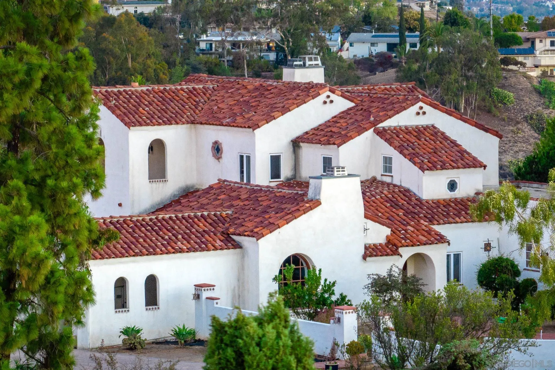553 Rimrock Road El Cajon, CA 92020 - Photo 6 of 43 a front view of a house with a yard