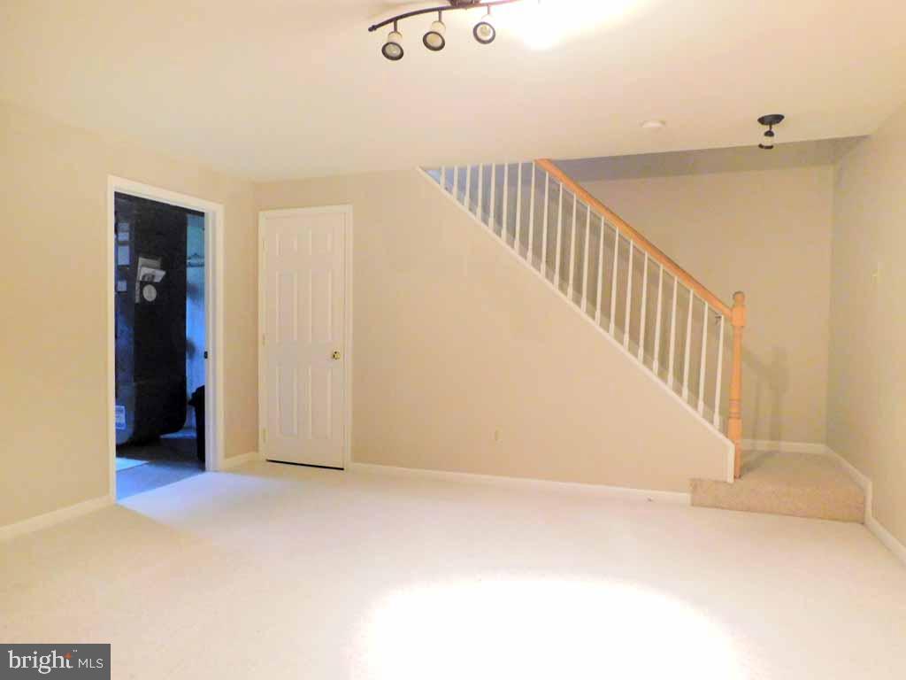 5469 Rinker Circle, Unit 299 Doylestown, PA 18902 - Photo 16 of 21 Staircase to Finished Basement
