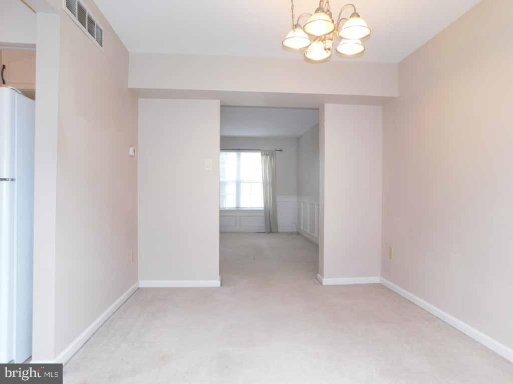 5469 Rinker Circle, Unit 299 Doylestown, PA 18902 - Photo 4 of 21 Dining Room with view of Living Room