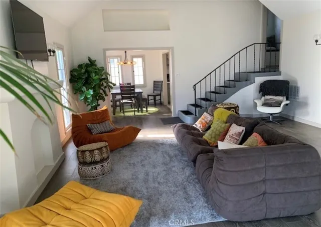 a view of a living room and dining room