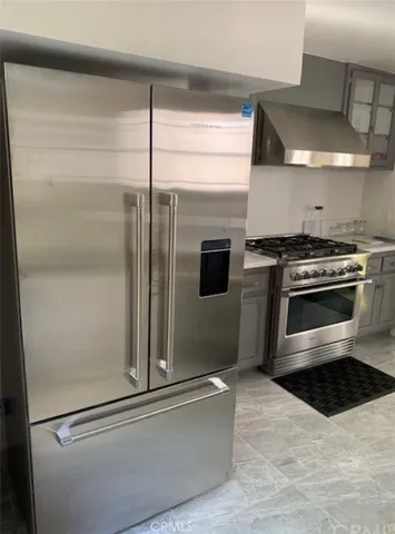 a bathroom with a granite countertop sink a shower and a mirror
