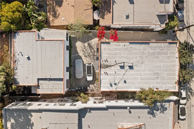 an aerial view of residential house with parking space