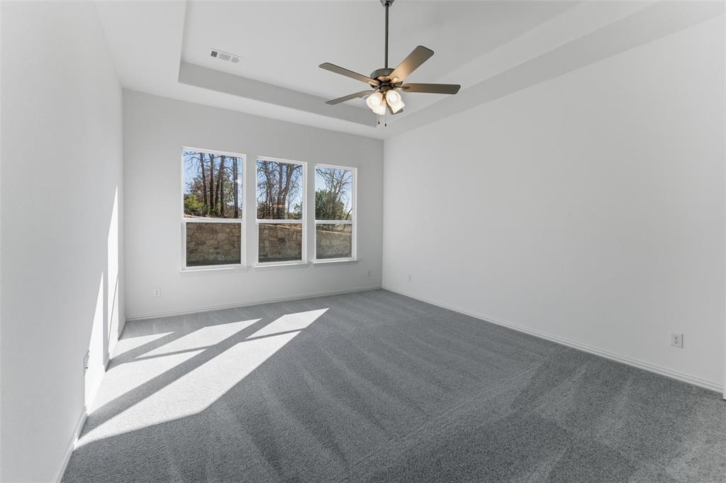 405 Hayden Faith Court Springtown, TX 76082 - Photo 22 of 30 a view of an empty room with a window