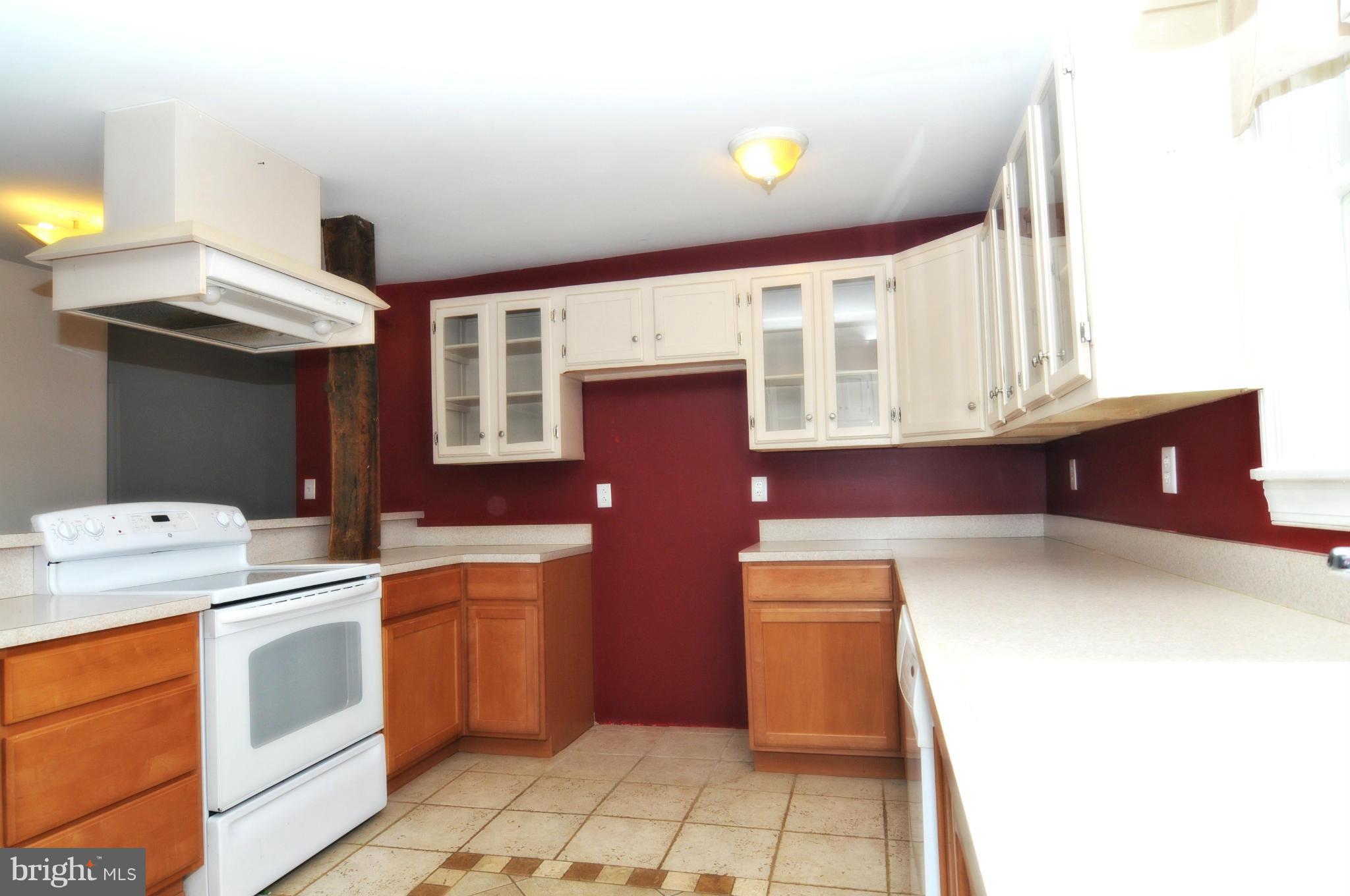 1460 Marble Quarry Road Union Bridge, MD 21791 - Photo 14 of 25 a kitchen that has a sink and a stove in it