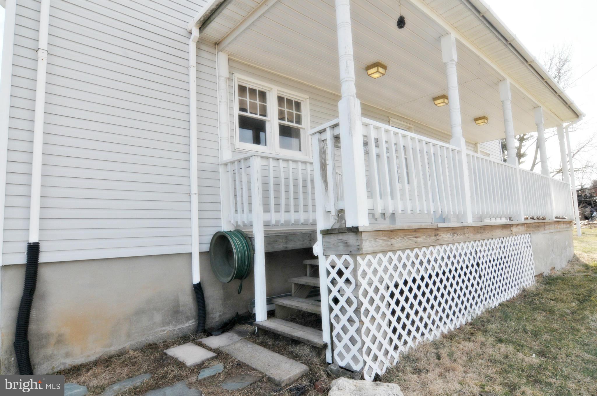 1460 Marble Quarry Road Union Bridge, MD 21791 - Photo 5 of 25 a front view of a house with parking