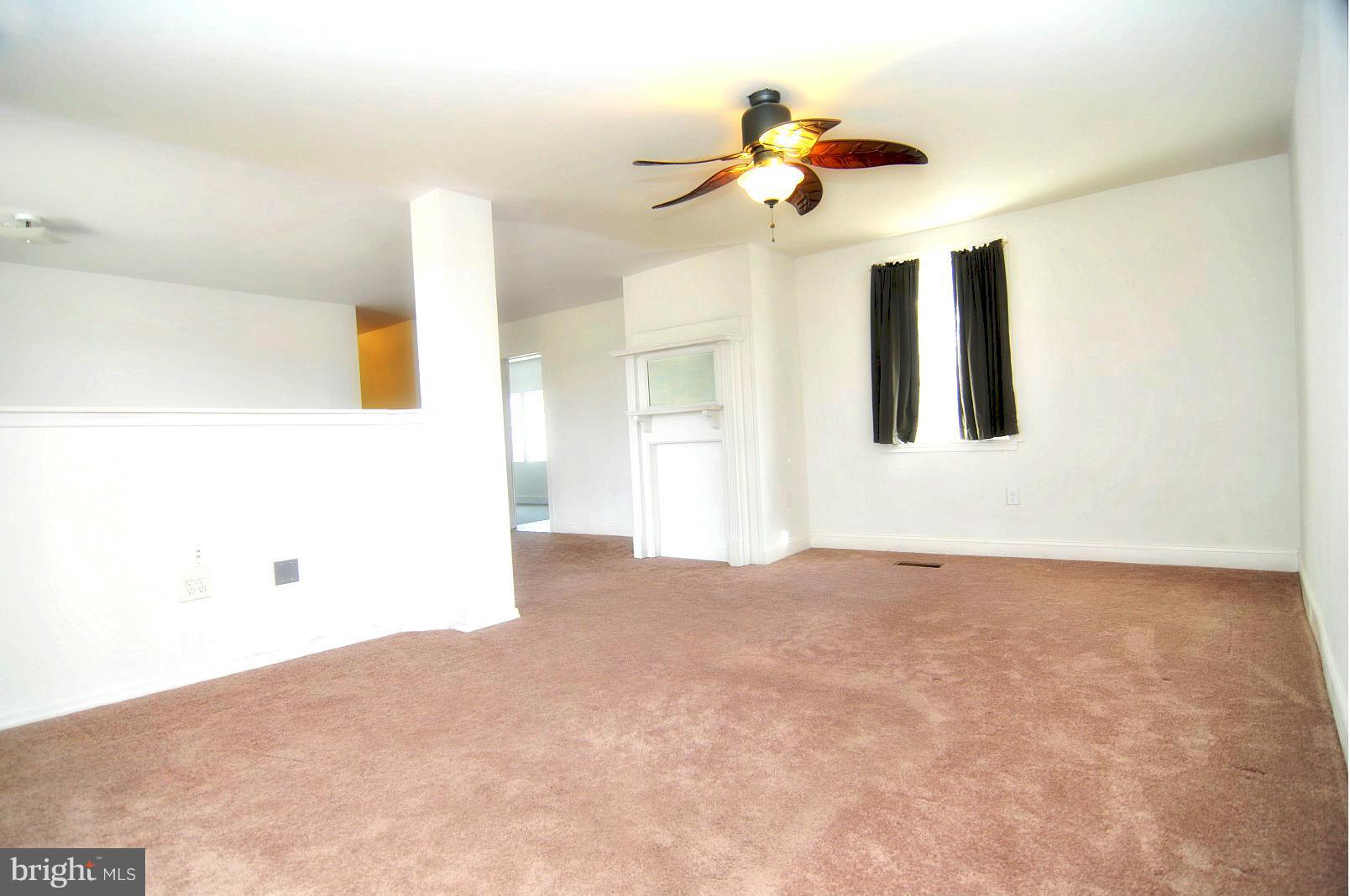 1460 Marble Quarry Road Union Bridge, MD 21791 - Photo 8 of 25 a view of a room with a ceiling fan